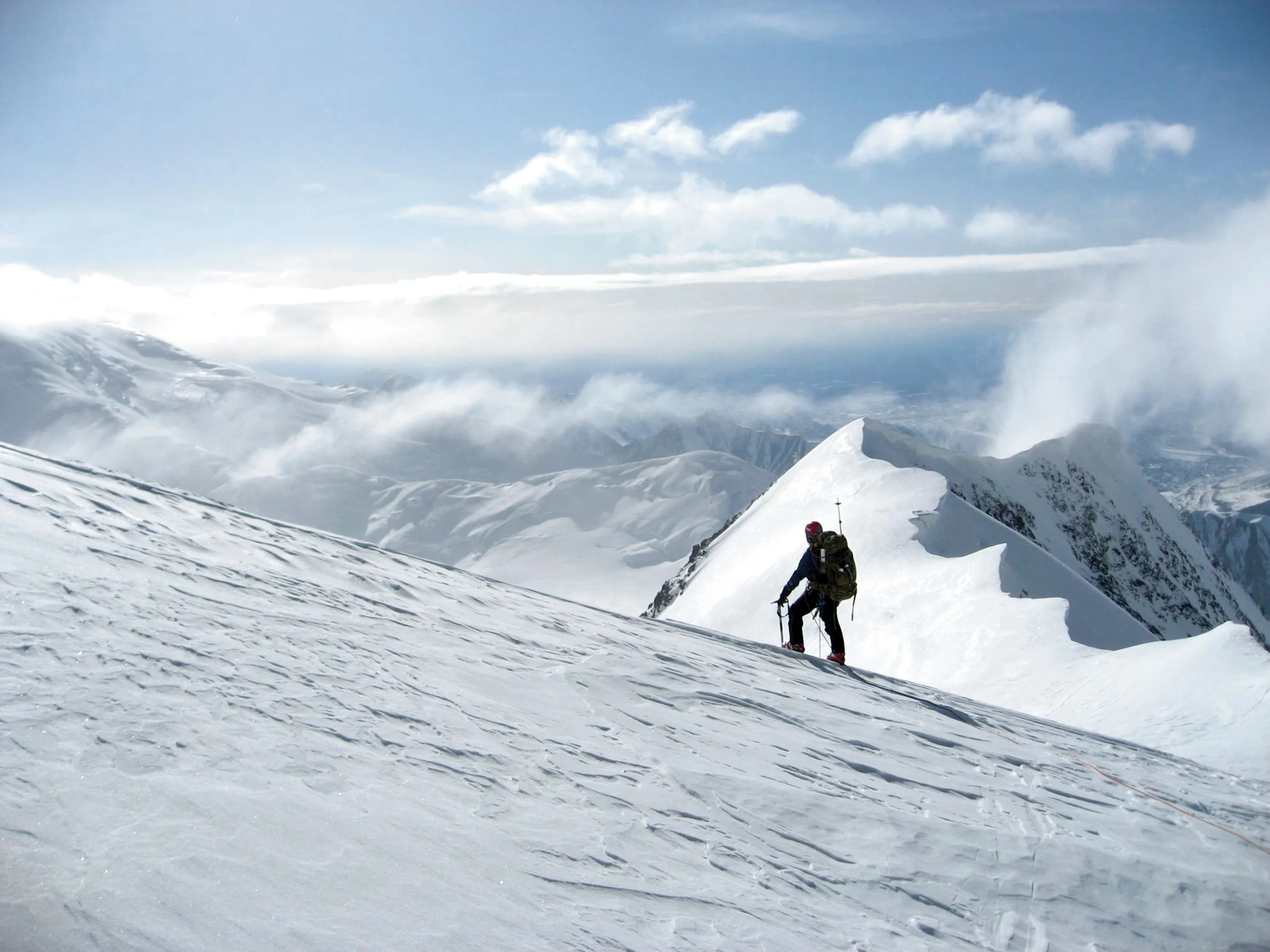 Climber ascending a snowy mountain peak, an image often tied to Philippians 4:13