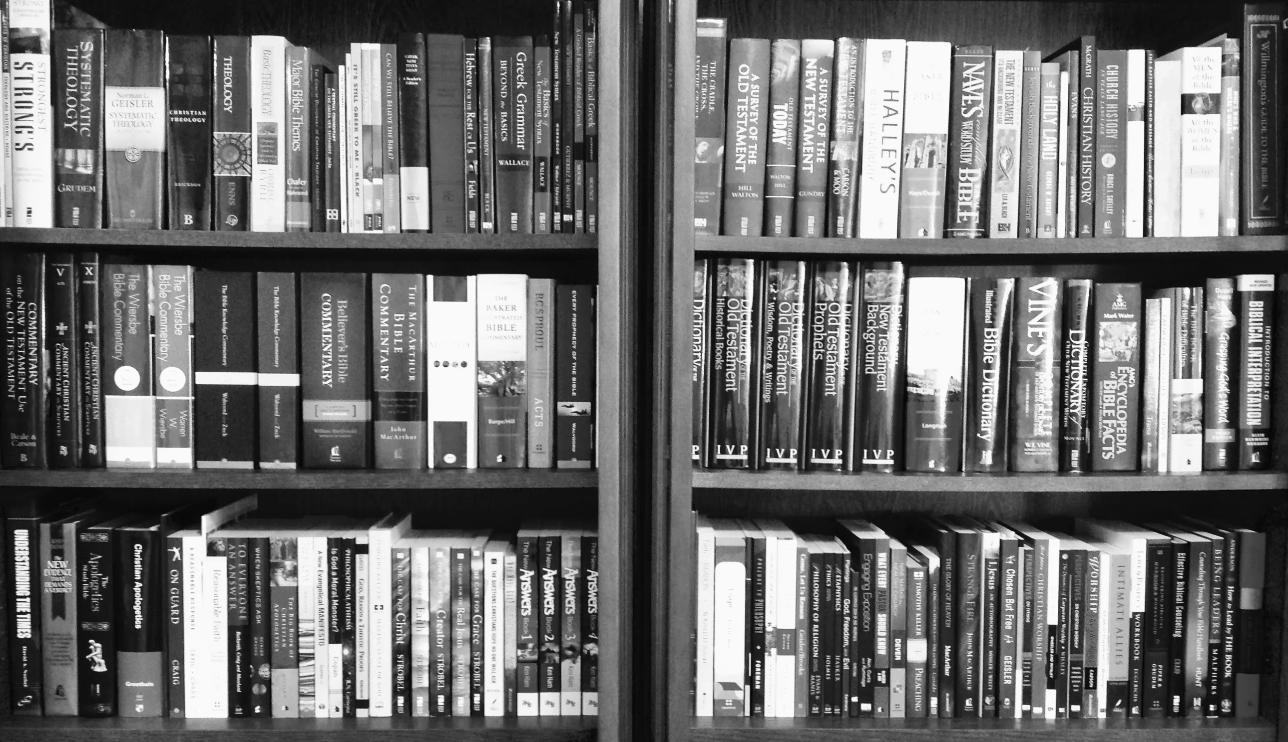 Shelves of theology, apologetics, and Bible reference books