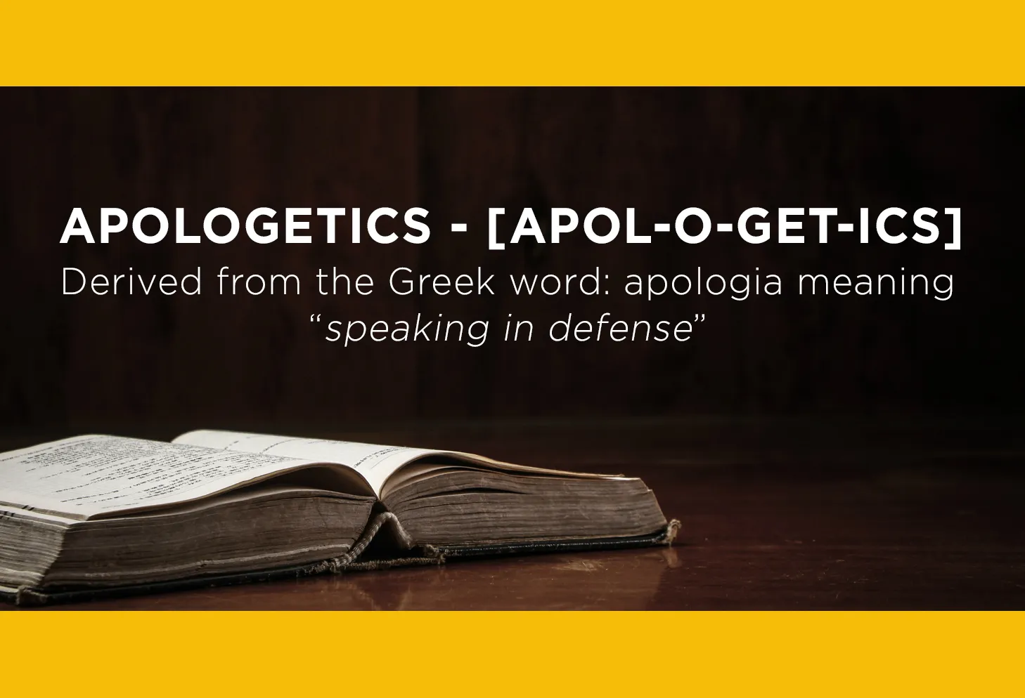 Open book with the definition of apologetics from the Greek apologia, "speaking in defense"